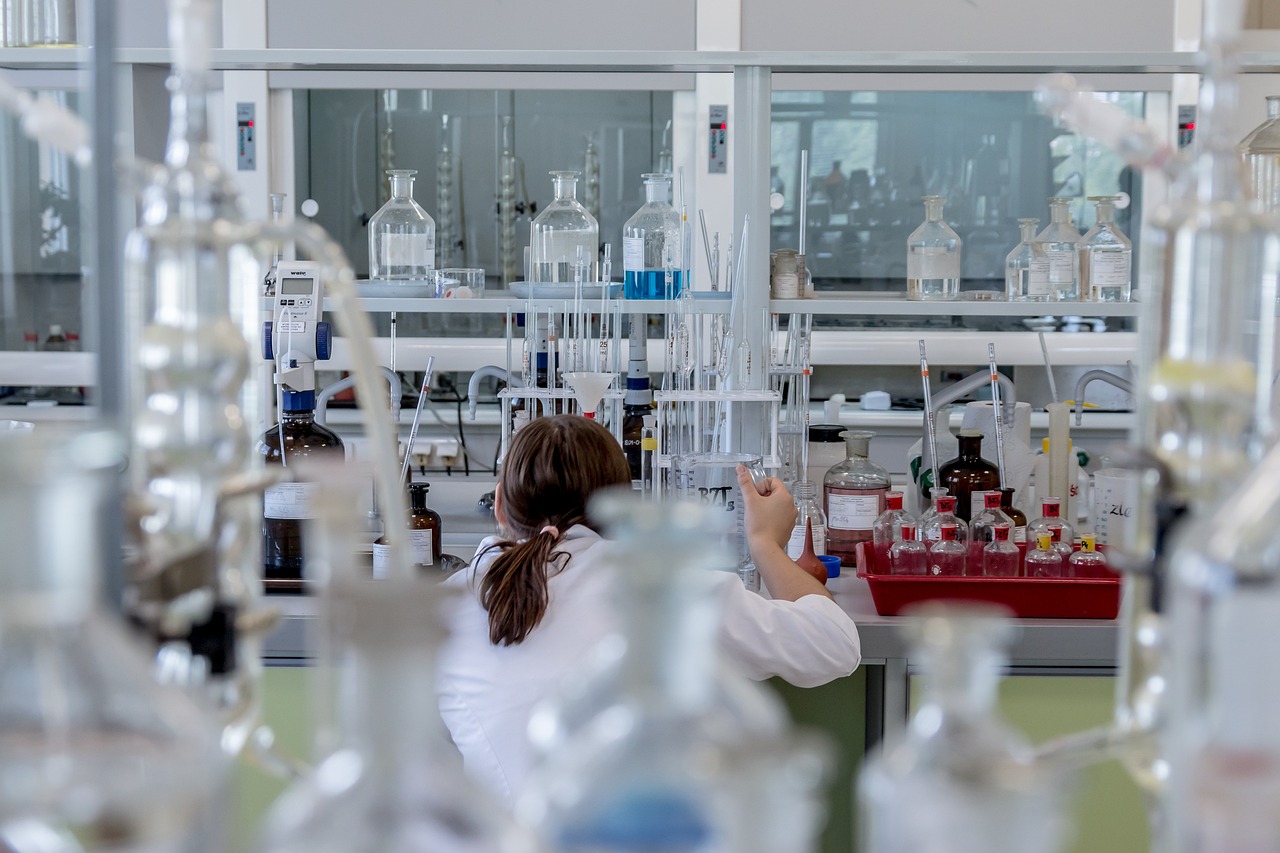 Researcher working in a clinical laboratory, representing drug development for diabetes treatment.